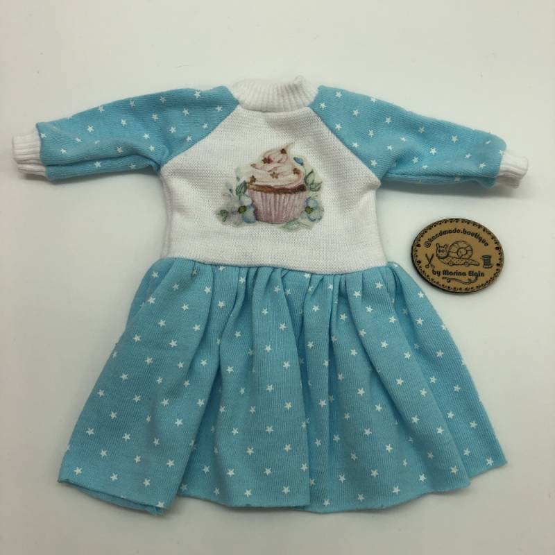 Light blue dress with stars and cupcake