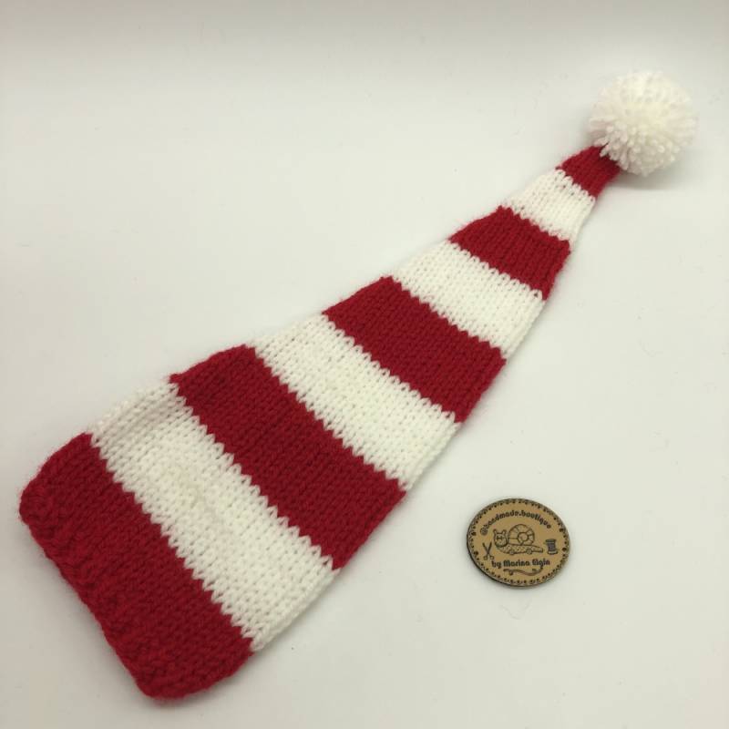 Red white striped hat with white pompon