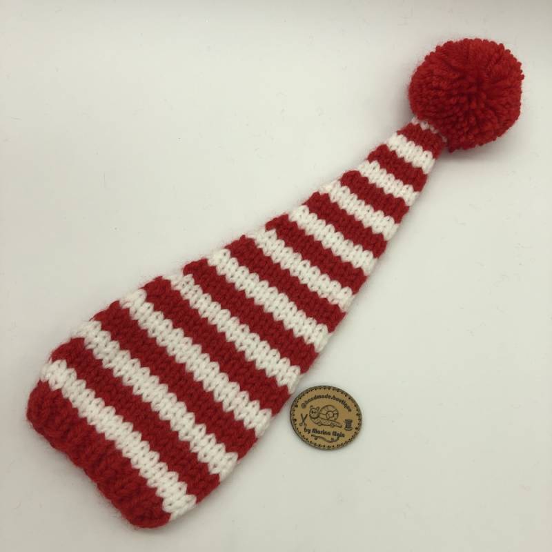 Red hat with mid-wide stripes and red pompon